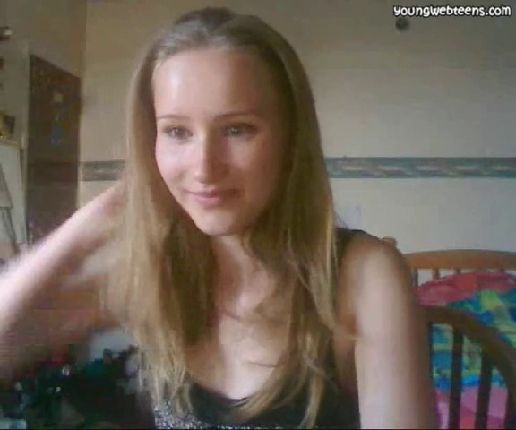 Spanish girl plays with huge tits